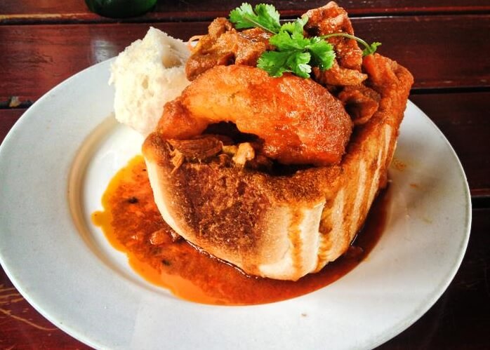 South African Bunny Chow A Portable, Spicy Curry, All Snug in Bread